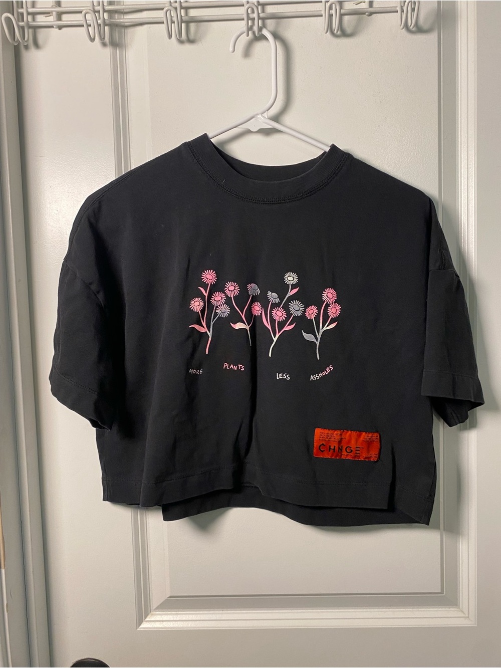 CHNGE Black Crop Tee with Pink Floral Graphic